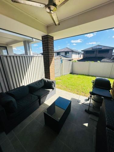 Delightful Austral Stay with AC and built-in wardrobe - Tap to explore photos