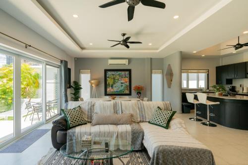 Luxury 4 Bedroom Beach House - Tap to explore photos