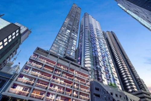 Central City Escape - Skyline Views, Pool & Parking - Tap to explore photos