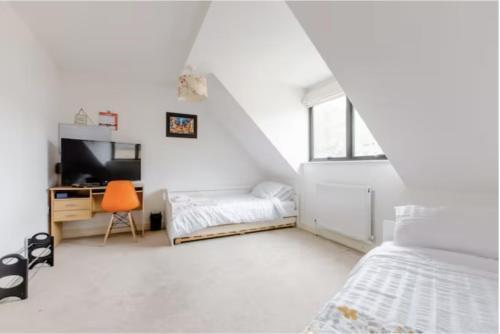 Chic DuoRooms with Modern Comfort for Families - Tap to explore photos