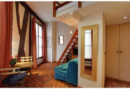 Studio convivial à Paris, 30 m² avec vue sur la ville - Tap to explore photos