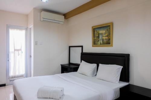 City View Studio at Green Bay Pluit Apartment By Travelio