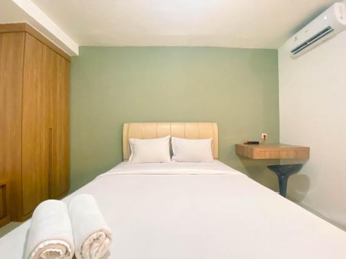 Comfy and Strategic Studio Apartment at Bassura City By Travelio