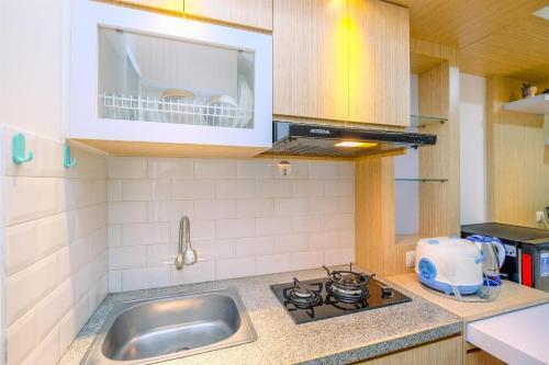 Best Deal and Simply Studio Bassura City Apartment By Travelio - Tap to explore photos