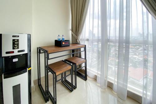 Comfort and Modern Studio Apartment at Menteng Park By Travelio - Tap to explore photos