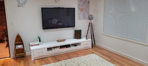 Beach front unit in Capel Sound - Tap to explore photos