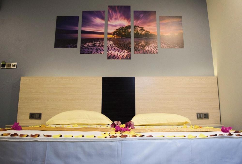 Dhiffushi Tourist Hotel - Tap to explore photos