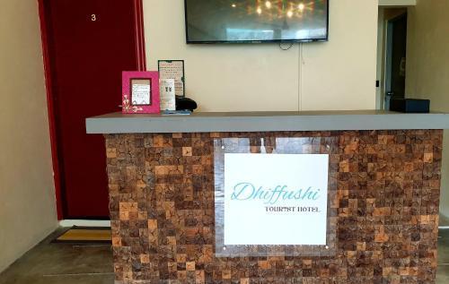 Dhiffushi Tourist Hotel - Tap to explore photos
