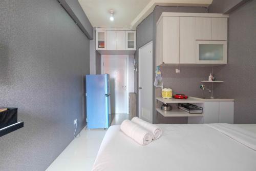 Mini Studio Green Pramuka Apartment By Travelio