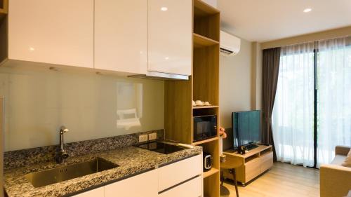 Diamond Apartment with Terrace near Bang Tao Beach - Tap to explore photos
