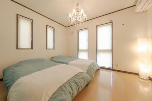 Hachioji Akatsuki Guest House - Tap to explore photos