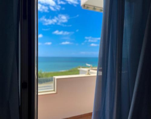 LA PERLA BIANCA Apartment - Near Train Station and Best Beaches with Amazing Sunsets Room Type - One-Bedroom Apartment with Sea View and Balcony