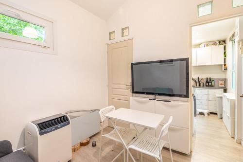 GuestReady - Appart. confortable avec jardin privé - Tap to explore photos