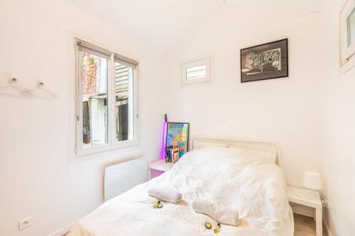 GuestReady - Appart. confortable avec jardin privé - Tap to explore photos
