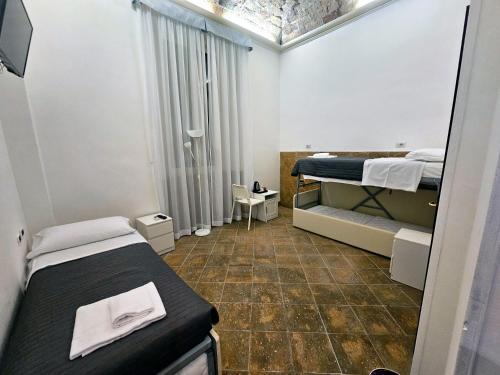 Check in Rome Room Type - Triple Room with Private Bathroom Check in Rome Room Type - Triple Room with Private Bathroom