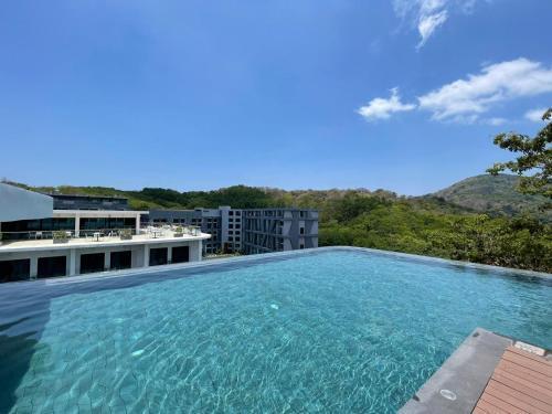 Utopia Naiharn by Fred&Com Phuket - Tap to explore photos