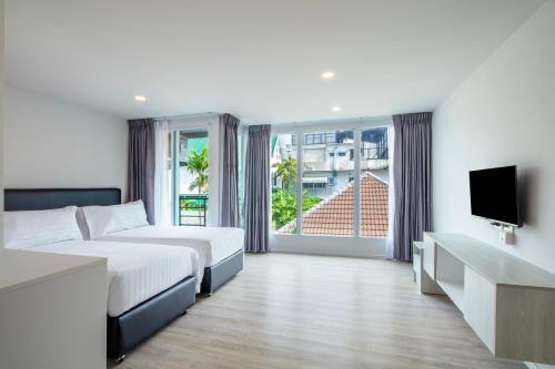 The Rizin Hotel Phratamnak Room Type - Deluxe Twin Room