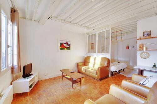 GuestReady - Appartement arty cosy et très central - Tap to explore photos