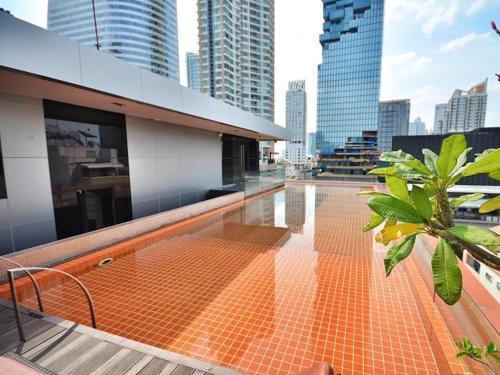 The Heritage Silom Hotel - Tap to explore photos