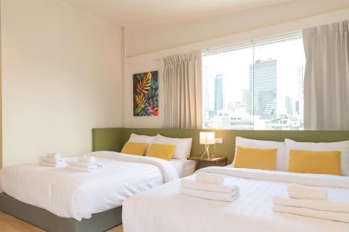 Samyan Story Boutique Hotel - Tap to explore photos