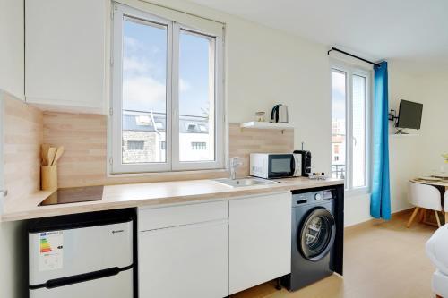 Grand studio Aubervilliers - Tap to explore photos