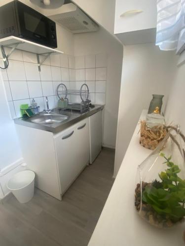 Charmant appartement proche CDG - Tap to explore photos