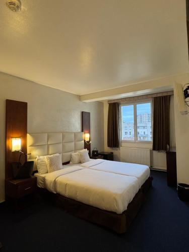 Hotel Grand Paris - Tap to explore photos