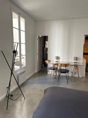 Au cœur du Marais, un joli studio ! - Tap to explore photos