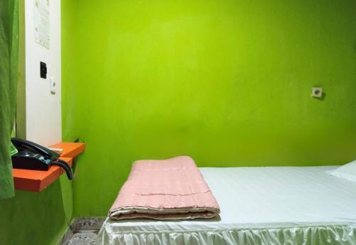 Seungit Guest House Syariah - Tap to explore photos