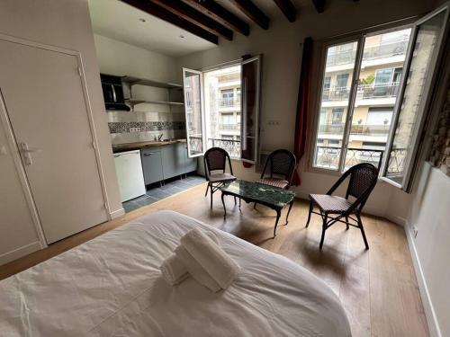 Cosy studio grenelle - Tap to explore photos