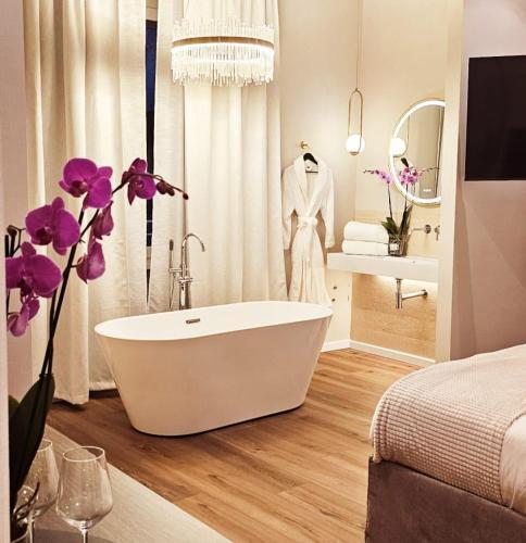 STOA ROME Boutique Suites - Tap to explore photos