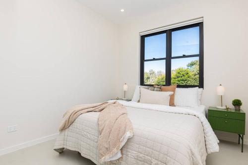 lBrand New beachside 2BR apt in prime Location - Tap to explore photos
