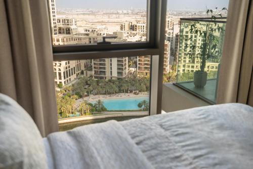 Luxury Water Front Retreat, The Palace Residences Dubai Creek, Full Beach and Canal View - Tap to explore photos