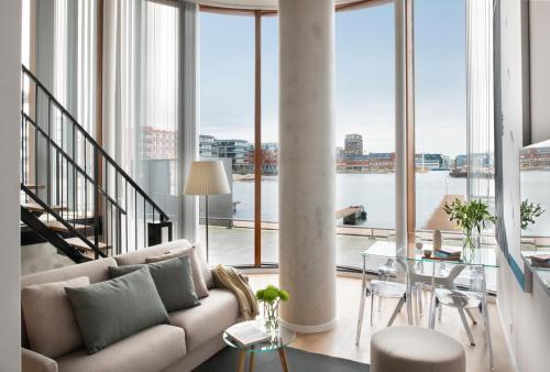 Eric Vökel Boutique Apartments - Riverfront Suites - Tap to explore photos