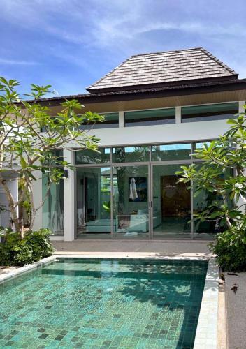 Lada Pool Villa - Tap to explore photos