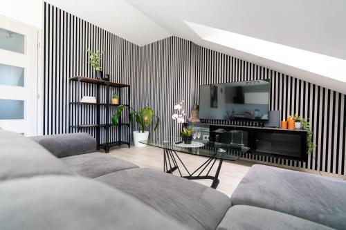 Vltava Design Apartments - Tap to explore photos