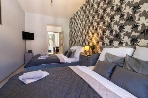 Vltava Design Apartments - Tap to explore photos