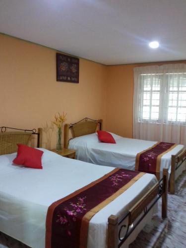 Mai Chenang Guesthouse - Tap to explore photos