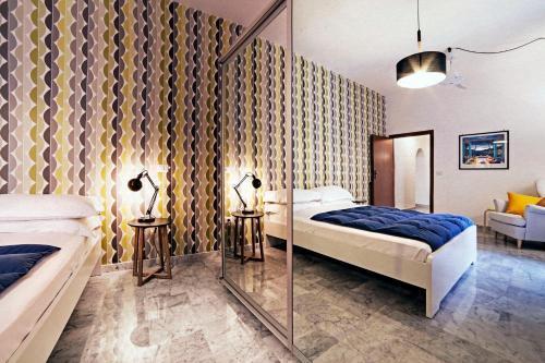 TrastevereHome - Elegant Stay near Villa Farnesina - Tap to explore photos