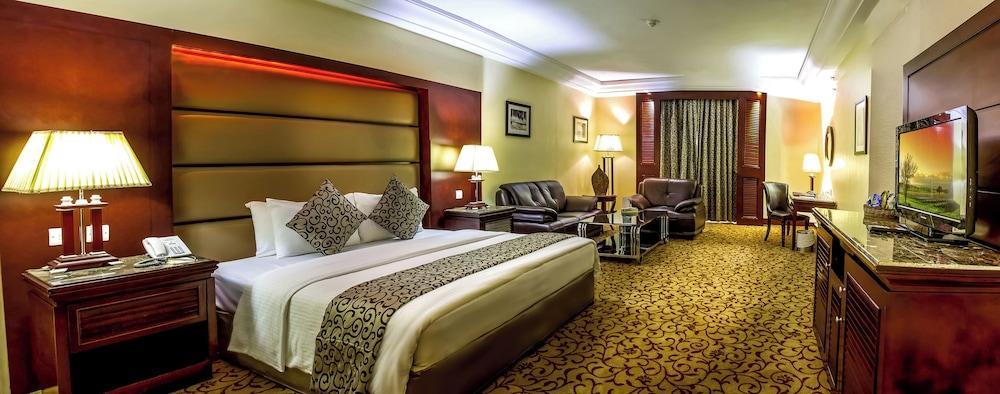 Grand Days Hotel & Suites - Tap to explore photos