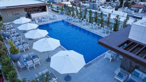 Swisstouches Hotel Amman - Tap to explore photos