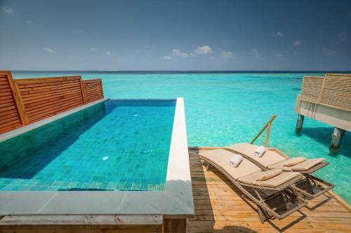 Kudafushi Resort & Spa - Tap to explore photos