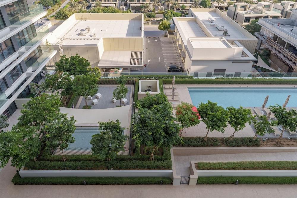 Maison Privee - Tranquil Living with Golf Course Vws in Dubai Hills - Tap to explore photos