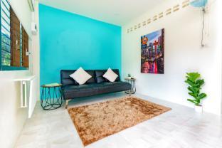 Modern Ao Nang Suite | King Bed + Lounge + Kitchen - Tap to explore photos