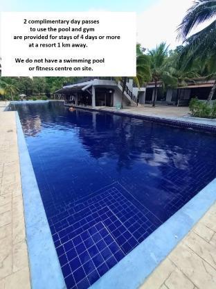 Modern Ao Nang Suite | King Bed + Lounge + Kitchen - Tap to explore photos