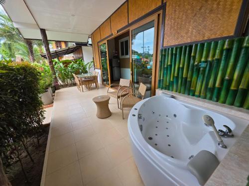 Jungle Village Bungalows - Tap to explore photos
