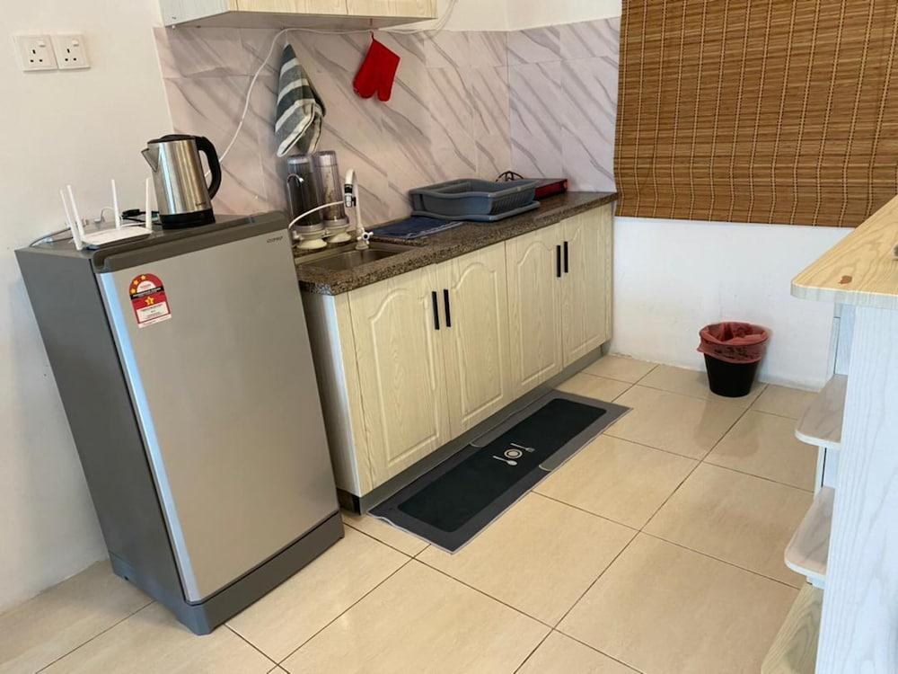OYO 91086 Bayu Service Apartment - Tap to explore photos
