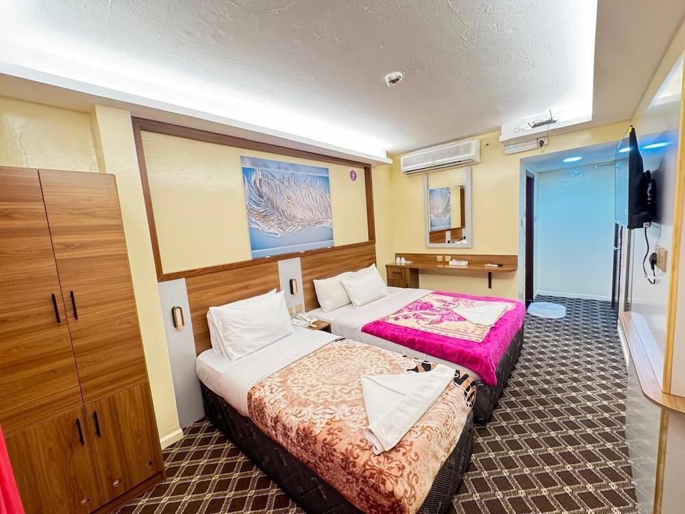 NAIF PALACE HOTEL Room Type - Standard Twin Room