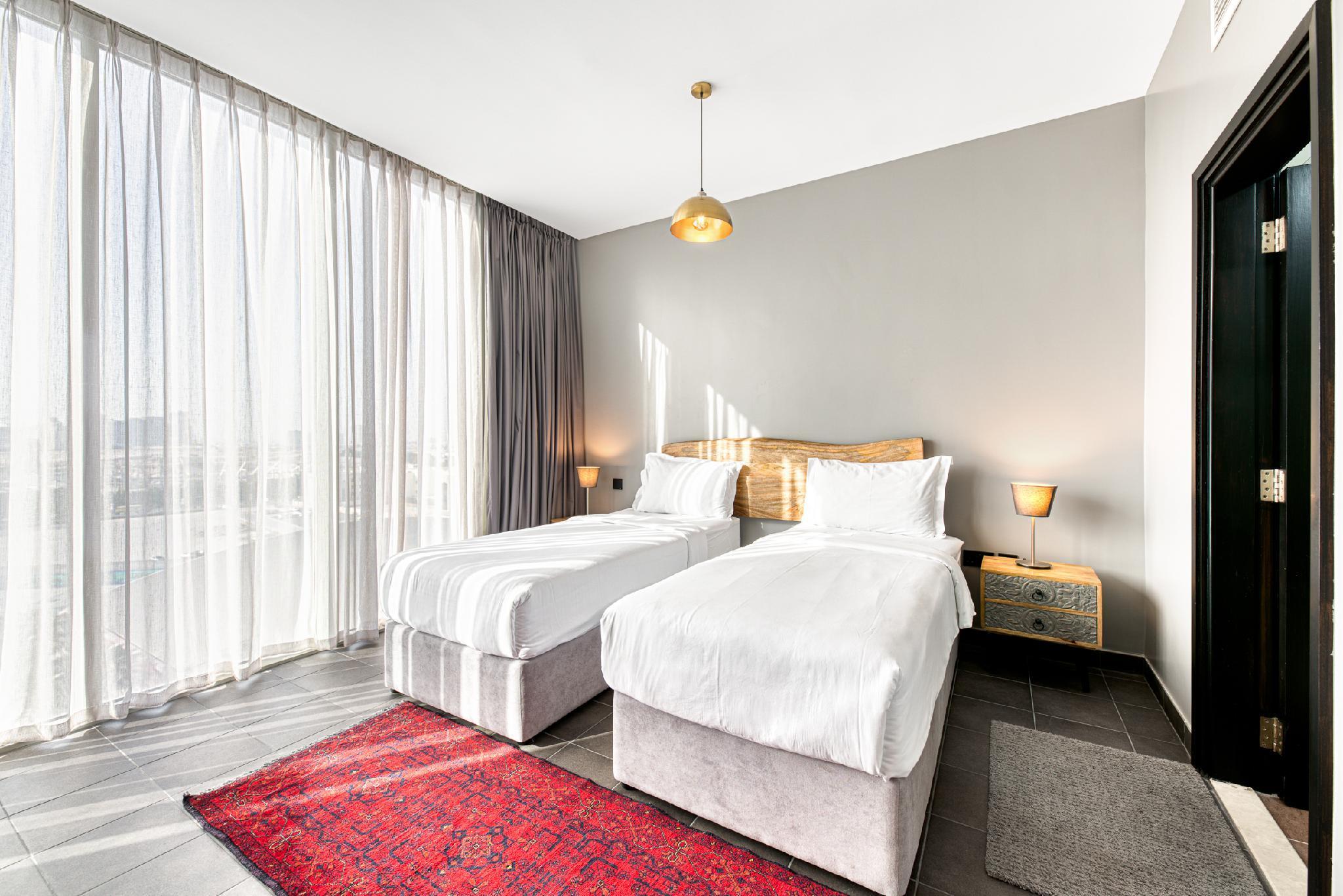 Emirates Sports Hotel Apartments - Tap to explore photos