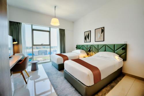 Capital Suites Hotel & Residences Room Type - Two Bedroom Sea view Queen and Twin Beds